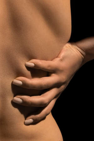 Hug. Detailed texture of human female skin. Close up part of womans body. Skincare, bodycare,...