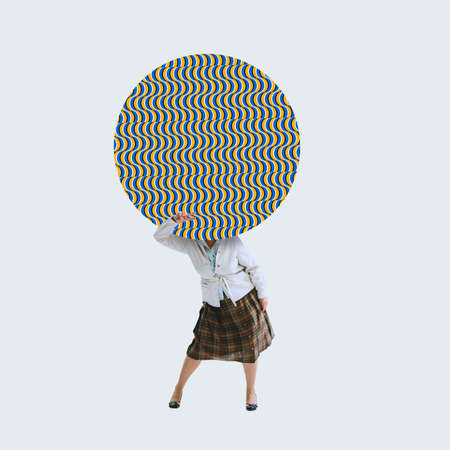 Contemporary art collage. Dancing woman with optical illusion design circle instead head symbolizing...