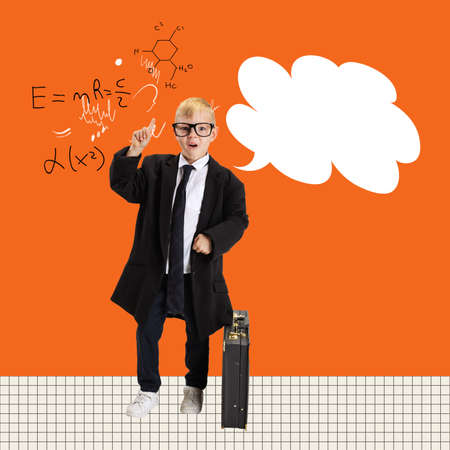 Cute little boy, kid businessman in huge jacket suit and with retro suitcase standing and thinking...