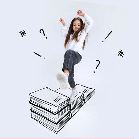 Conceptual image with school age girl stepping on drawn books isolated on grey background....