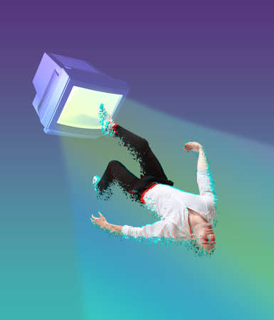 Contemporary art collage and modern design. Retro computer monitor draws a man into itself on blue...