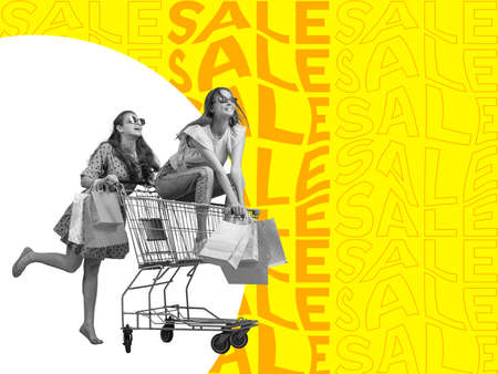 Creative poster, flyer with two happy girls with shopping bags ride on shop cart isolated on colorful abstract background. Concept of sales, black friday, discount, emotionsの写真素材