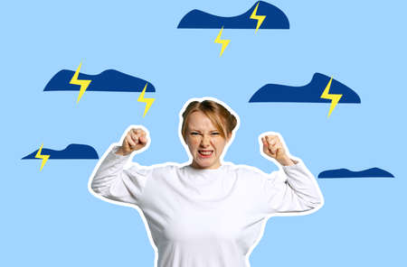 Young angry girl shouting on blue background with drawn clouds and lightning. Collage in magazine...