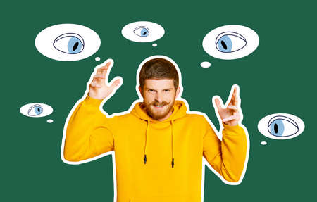 Contemporary art collage. Young man shouting among a lot of eye sights isolated on green background....