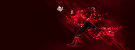 Flyer with arabian woman, soccer goalkeeper in action isolated on dark red background with polygonal...