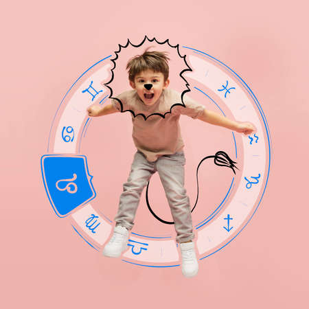 Thematic image of cute kid with drawing of zodiac signs isolated on pink background with pencil...