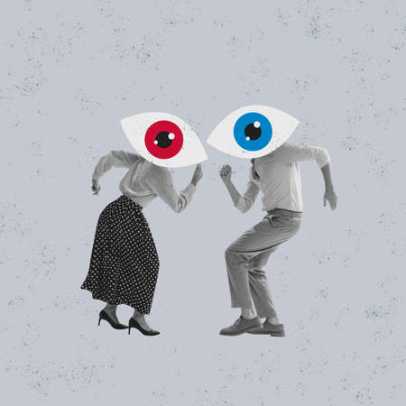 Contemporary art collage. Conceptual image. Two people, man and woman with giant eyes heads dancing. Blindly followingの写真素材