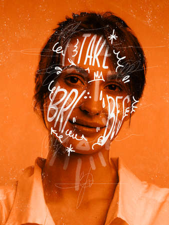 Closeup. Young girls portrait with white lettering expressing psychological problems on her face....