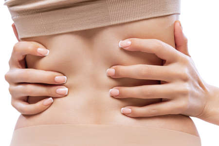 Hug. Detailed texture of human female skin. Close up part of womans body. Skincare, bodycare,...