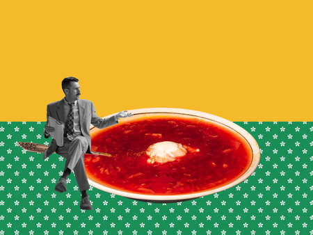 Contemporary art collage. Creative design. Serious man sitting ion big plate with traditional Ukrainian dish - borshch. News readingの写真素材
