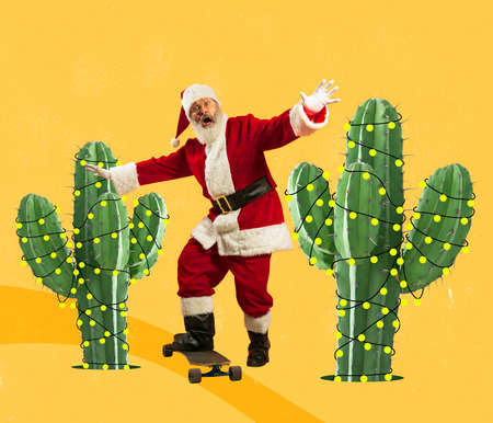 Contemporary art collage. Creative design. Senior man, Santa Claus on skateboard riding around cactus on yellow backgroundの写真素材