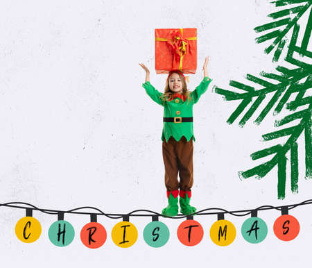 Contemporary art collage. Creative design. Cheerful little gitl, child in image of elf holding big present box. Celebrationの写真素材