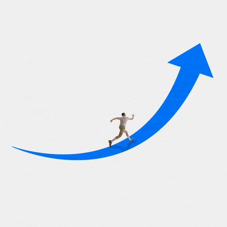 Young man running forward towards his goal along the blue arrow over white background. Concept of business, art, psychology of successの写真素材