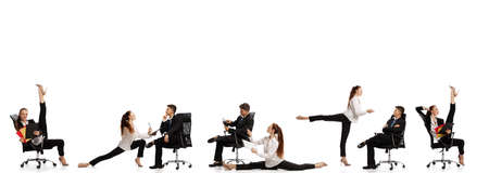 Destroy gender stereotypes. Young office workers in business suits in action isolated on white background. Business, rights, addiction concept.の写真素材