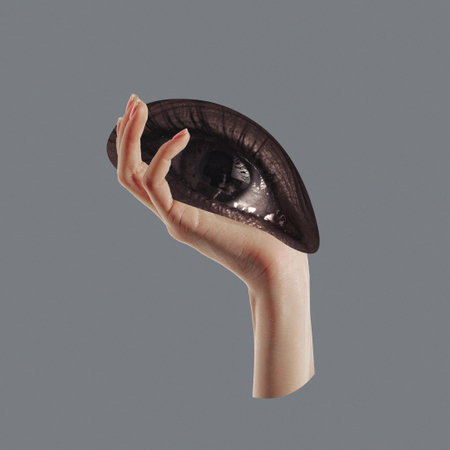 Hand holding big human eyes. Modern design, contemporary art collage. Inspiration, idea, trendy urban style. Surrealism, minimalism.の写真素材