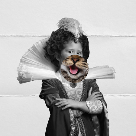 Princess. Cute little girl as medieval royal person in vintage clothing with part of cats face over light background. Comparison of eras, art, surrealism. Contemporary collage.の写真素材