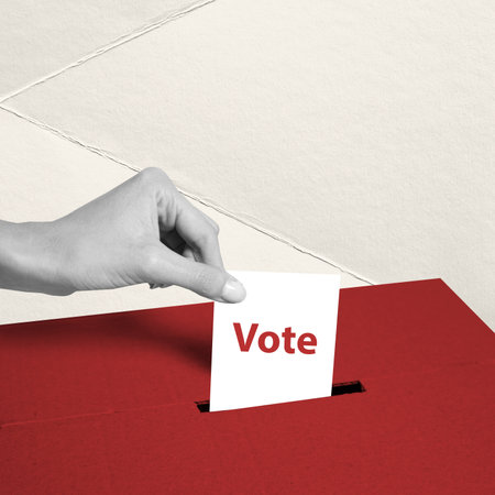 Creative design. Conceptual image. Female hand putting voting blank, ballot into box.の写真素材