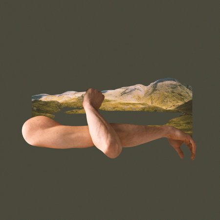 Contemporary art collage. Creative design. Muscular male hands over small piece with beautiful nature, mountain landscape over grey backgroundの写真素材