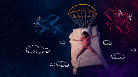 Creative design with line art over space background. Little smiling girl, child sleeping and flying on air balloon in her dreamsの写真素材