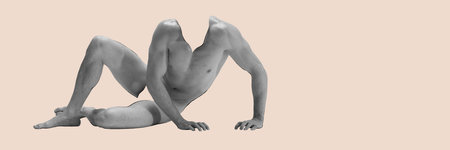 Body art, aesthetics. Human body. Muscular relief strong male body isolated over light pastel backgroundの写真素材