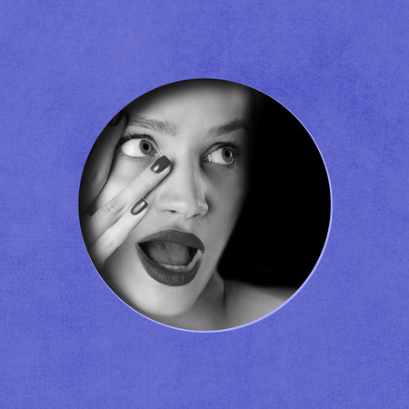 Femininity. Black and white image of beautiful female face in circle against blue background. Contemporary art collage. Conceptual design.の写真素材