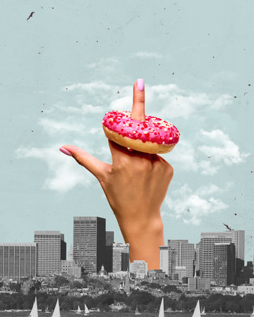 Female hand with sweet pink donut over black and white city landscape with skyscrapers. Contemporary art collage.の写真素材