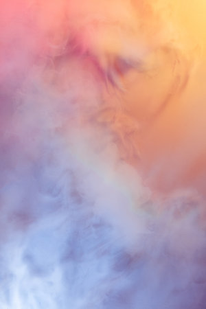 Colorful abstract image of multicolored smoke spreading in neon colors. Design for gadgets wallpaper, background, advertising and designの写真素材