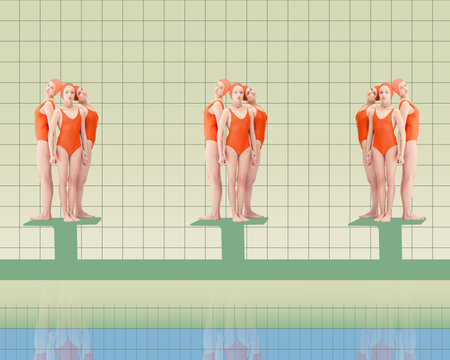 Young female swimming athletes in red swimsuits standing on starting blocks, ready to jump into pool and swim. Contemporary art collage.の写真素材