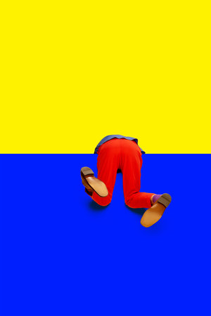New opportunities. Male legs in red pants and classical shoes over vivid yellow blue background