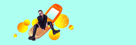 Stylish young girl in black clothes sitting on retro mobile phone. Communication. Contemporary art...