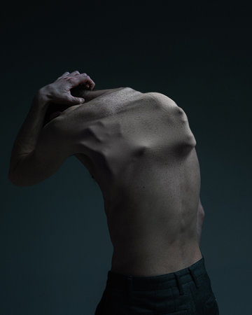 Depression and mental breakdown. Young man suffering from mental problems, hidden fears and social pressure. Conceptual collage.の写真素材