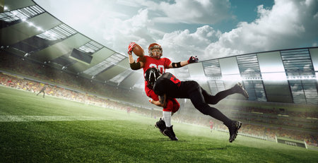 Win and lose. Professional athletes, american football players in motion during game, running, playing at 3D stadium.の写真素材