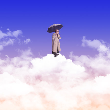 Senior woman standing on clouds with umbrella. Hidden fears and unknown path. Contemporary art collage.の写真素材