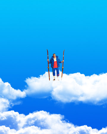 Man standing on clouds with skis over blue sky background. Winter sports, vacation, active lifestyle. Contemporary art collage.の写真素材