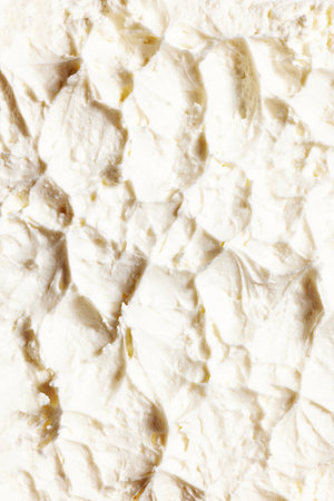 Close-up of delicious, sweet, organic cream with textured waves. Sweet cream for cakes and dessertsの写真素材