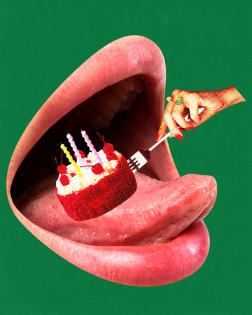 Female hand putting birthday cake with candles in giant open female mouth over green background....
