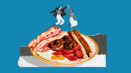 Happy young man and woman in retro clothes dancing on plate with English breakfast with eggs, sausages and bacon. Contemporary art collage.の写真素材