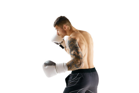 Muscular strong athletic young guy, athlete training, boxing isolated over white background. Strong handsの写真素材