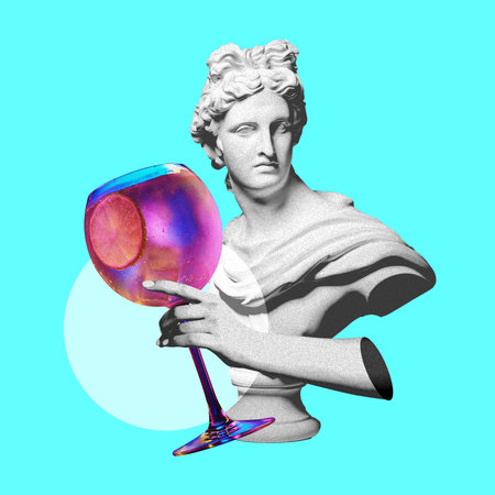Antique statue buys and hand holding delicious cocktail over blue background. Contemporary art collage. Modern drinksの写真素材