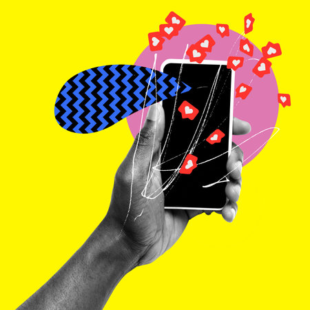 Human hand holding mobile phone with many social media likes appearing. Influence and popularity....