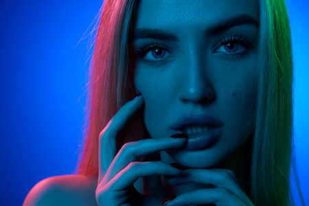 Portrait of attractive, sensual, beautiful young woman with blonde hair, plump lips and perfect skin...