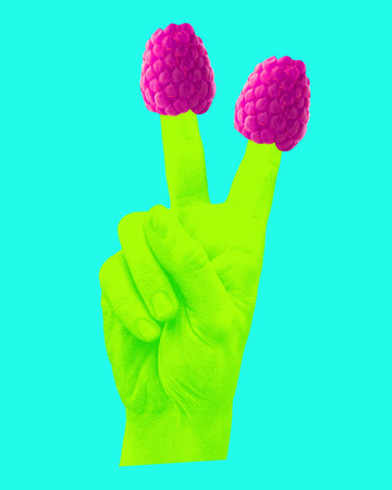 Green hand making peace sign with two raspberries on its fingers against turquoise background....