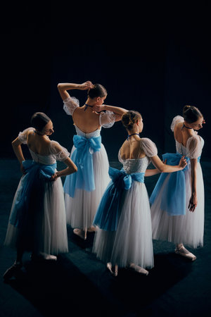 Swift, elegant movements of ballerinas captured in ghostly blur, creating ethereal and hauntingly beautiful scene.の写真素材