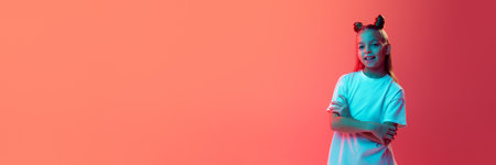 Portrait of young girl in white t-shirt in stylish hairstyle smiling against pink background in neon...