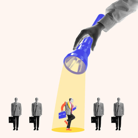 Large hand holding flashlight highlighting unique candidate among other people, emphasizing importance of standing out in hiring process. Contemporary art collage.の写真素材