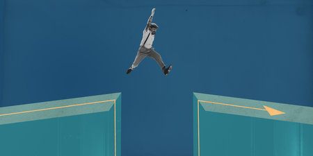 Man leaping across large gap between two platforms, representing risk-taking or bridging challenges...