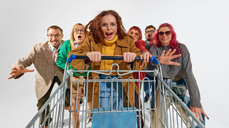 Group of super emotional and excited people pushing shopping cart forward with craziness....
