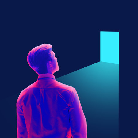 Man in business suit standing, gazing at glowing door of opportunity. Facing new possibilities and entering future of potential.の写真素材