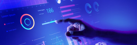 Hand interacting with comprehensive business dashboard displaying various data insights and...