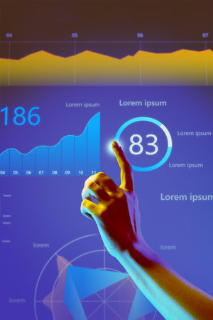 Hand glowing under colorful business insights display with graphs and metrics. Highlights concepts...